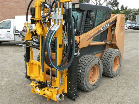 rock drill attachment skid steer|skid steer mounted rock drill.